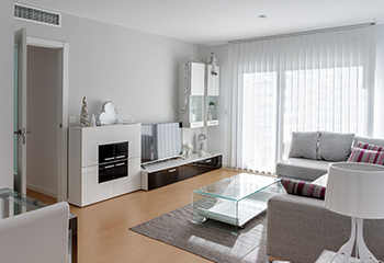 Bright modern living room adorned with sleek vertical blinds